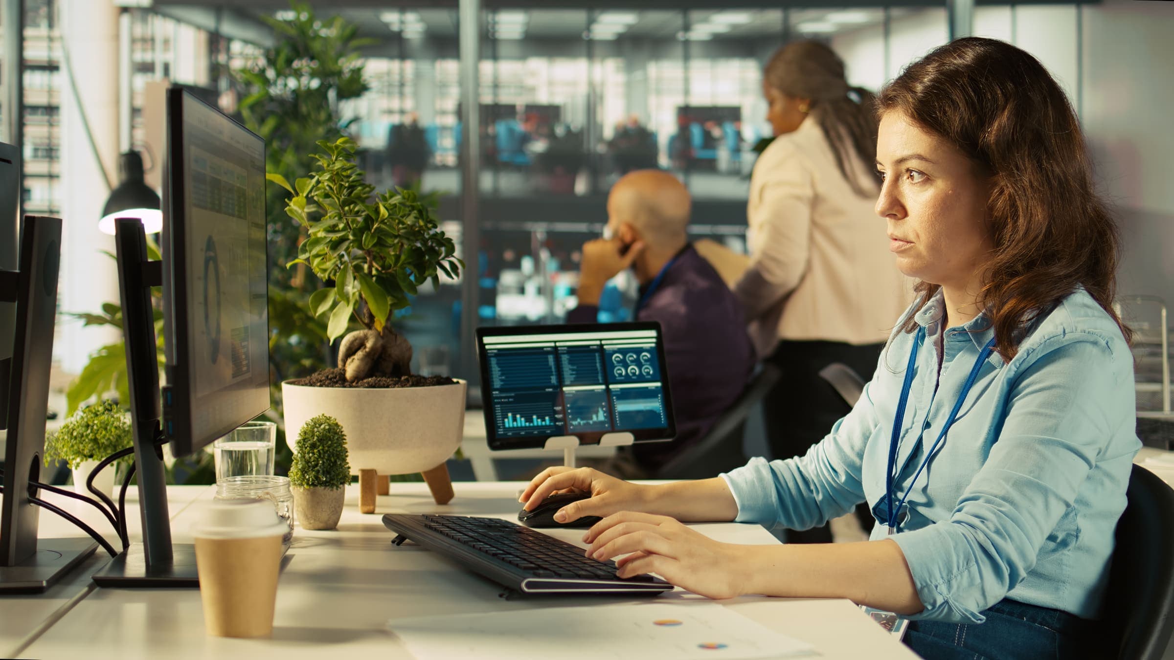 Dashboard interface on laptop and business discussion